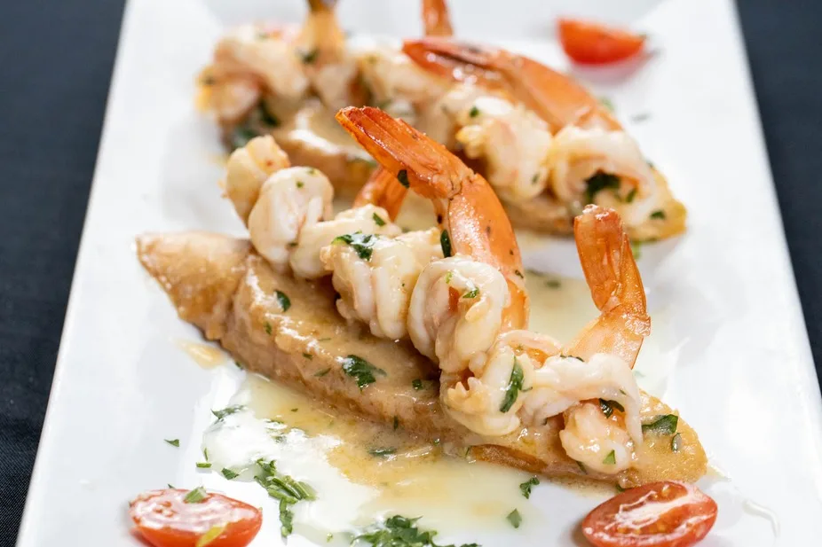 Shrimp scampi over toast points