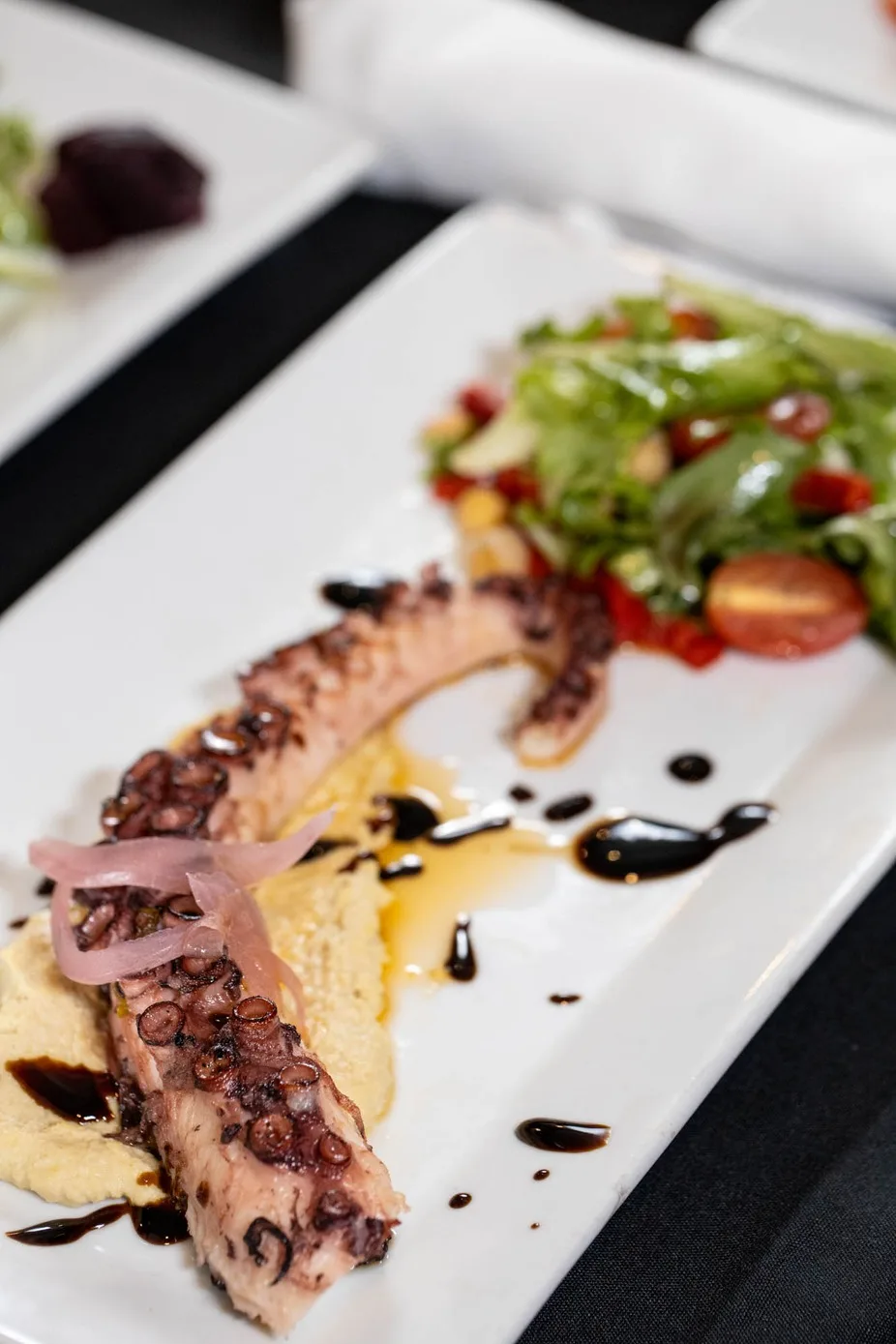 Octopus and salad plating