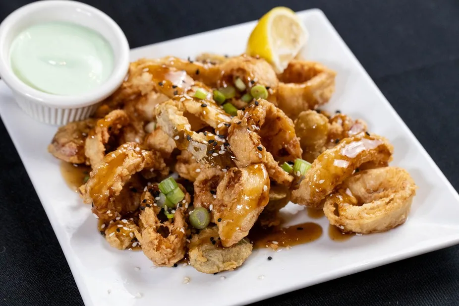 Calamari with scallions and sesame