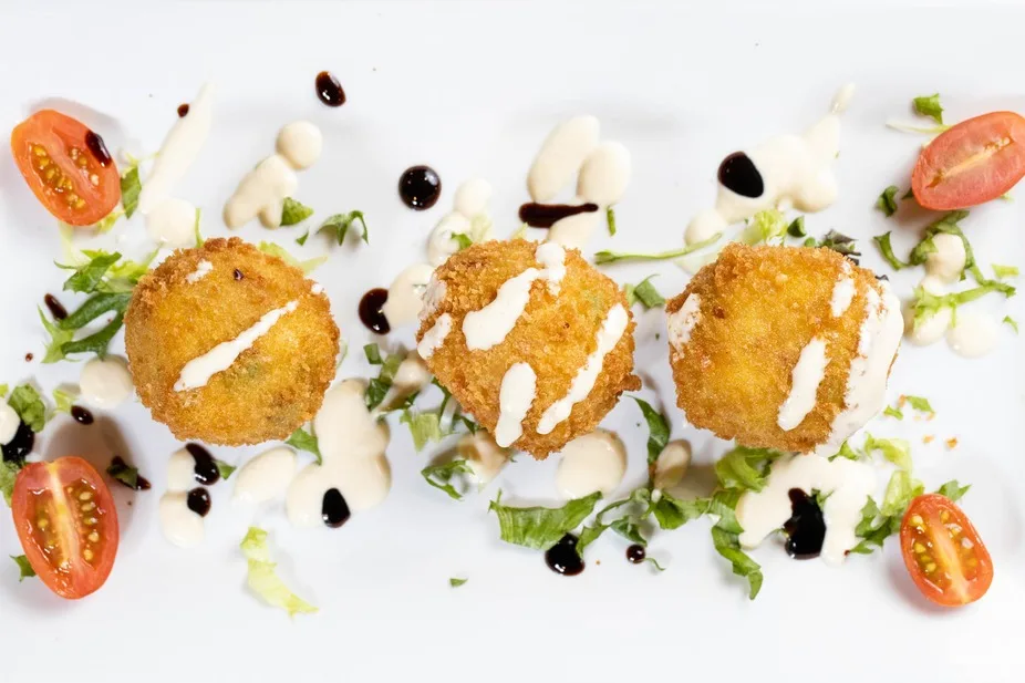 Arancini with balsamic drizzle