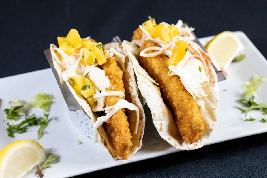 Fish tacos with mango slaw