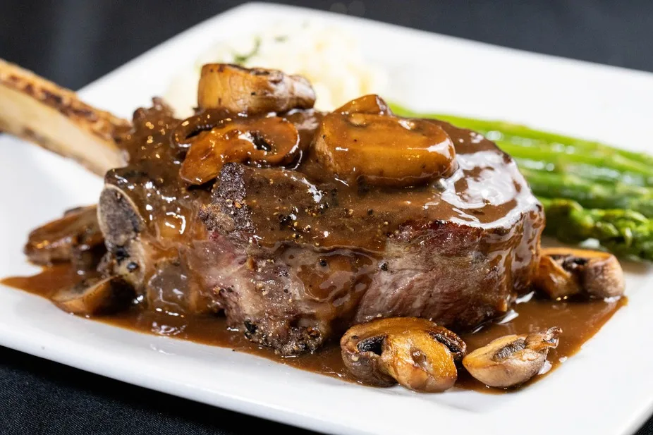 Bone-in chop with mushroom sauce